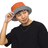 CHECKMATE 47PRINT REVERSIBLE BUCKET HAT ORANGE GREY